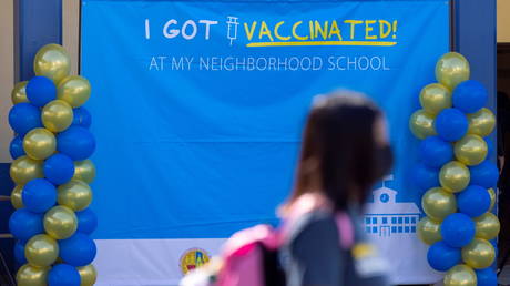 FILE PHOTO: A mobile vaccination site is seen at a school in Los Angeles, California, August 30, 2021.