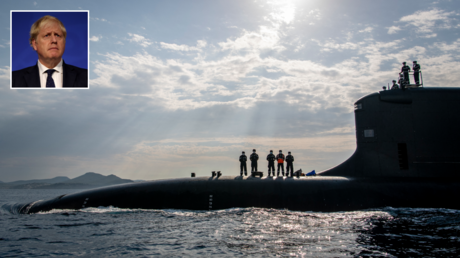 French navy nuclear attack submarine Suffren. © AFP / Naval Group; (inset) Britain's Prime Minister Boris Johnson. © AFP / DAN KITWOOD