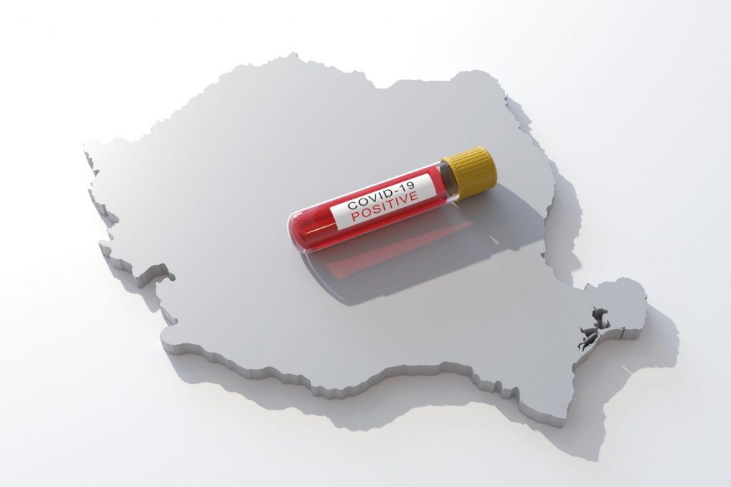 Harta României cu un test COVID pe ea.