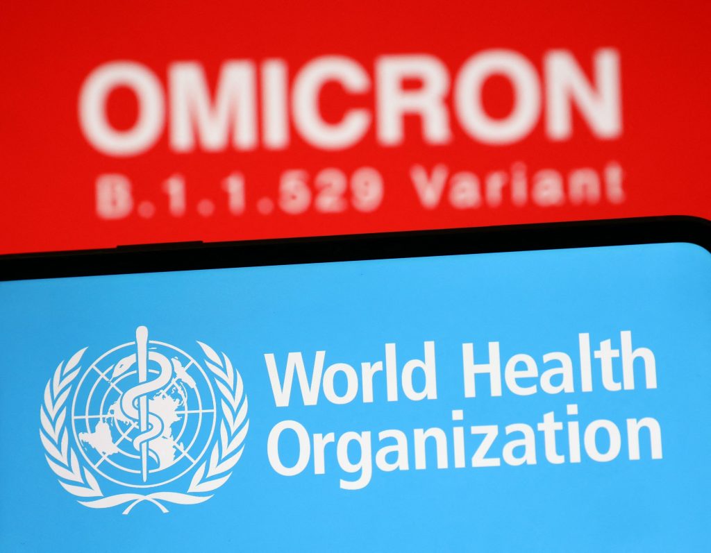 ANKARA, TURKEY - NOVEMBER 29: In this photo new COVID-19 variant: Omicron (B.1.1.529) is displayed on a screen and the logo of World Health Organisation is seen front in Ankara, Turkey on November 29, 2021. Hakan Nural / Anadolu Agency/ABACAPRESS.COM