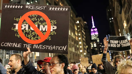 FILE PHOTO:  Activists accusing President Donald Trump of 'collusion' with Russia march in New York City, November 8, 2018.